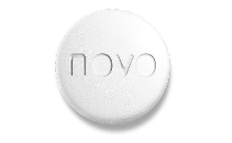 Wegovy oral semaglutide round white tablet with Novo embossed — close-up