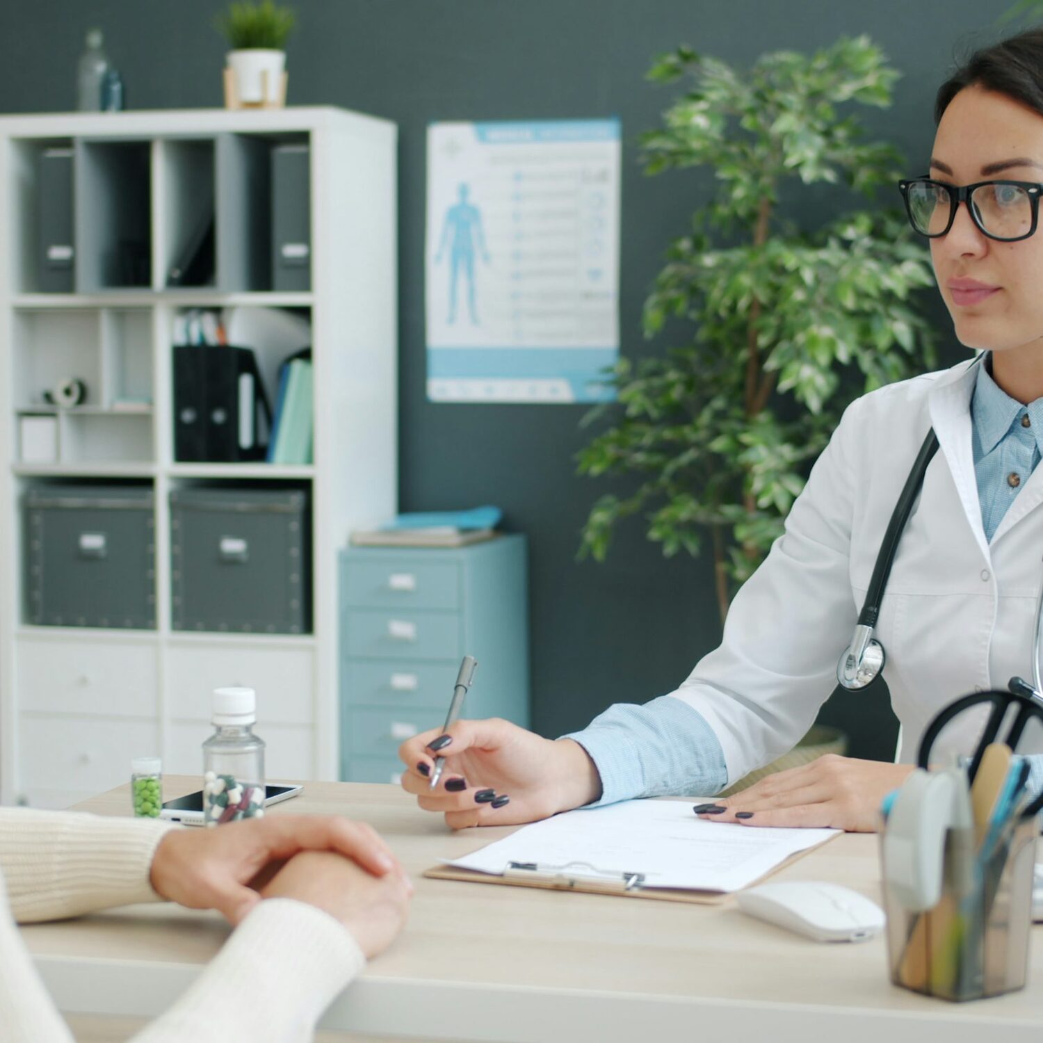 Doctor consulting with patient in a modern clinic